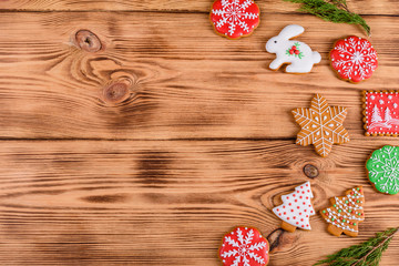 Christmas homemade gingerbread cookies on wooden table. It can be used as a background