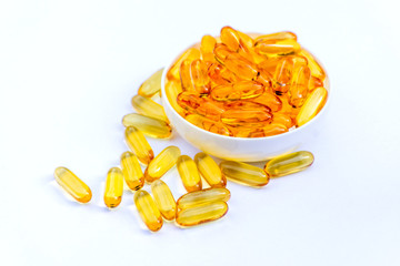 Fish oil omega 3 capsules in a lid