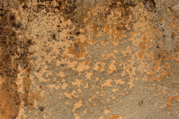 Texture of a concrete wall with cracks and scratches which can be used as a background