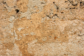 Texture of a concrete wall with cracks and scratches which can be used as a background
