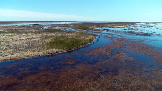 Aerial Panorama view to saline Barsa Kelmes lake and Ustyurt plateau , Karakalpakstan, Uzbekistan.
