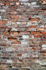 Wall or fence of old red brick. Background