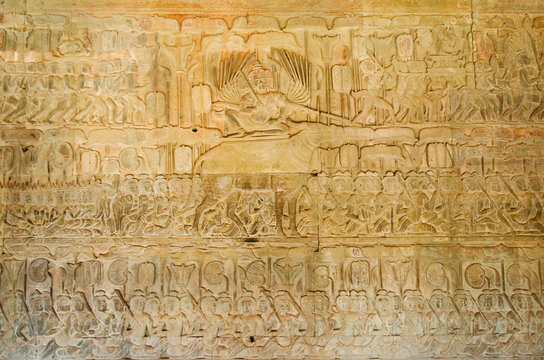Story of Yama God of Death of Hinduism Mythology on the Stone Wall Carving inside of Angkor Wat at Siem Reap Province, Cambodia.