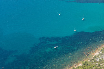 View of Cassis town, Cap Canaille rock and Mediterranean Sea from Route des Cretes mountain road, Provence, France