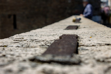 Rome, Italy 07/07/2019. The wall of the bridge over the river, where to lean to see the view.