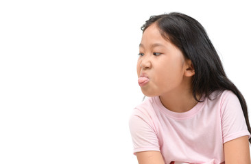 Girl with funny expression and sticking tongue out