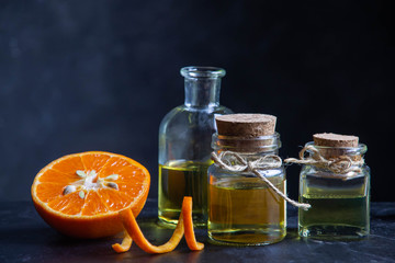 Pure orange essential oil aroma and orange scent essential oil bottle - concept for good health