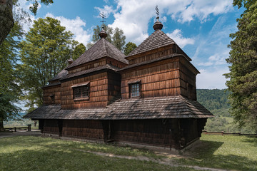 Fototapeta na wymiar Old orthodox Greek Catholic wooden church in Bieszczady Mountains, Poland.