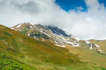 Caucasus Mountains, Georgia. Snow on the tops of the mountains in June, beautiful nature