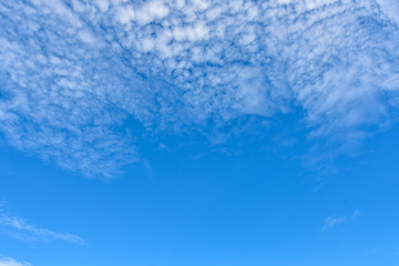 blue sky with white, soft clouds