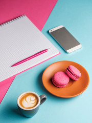 Coffee break in a colorful girly workspace