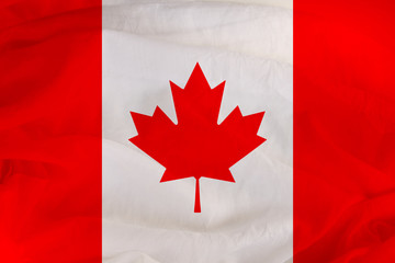 national flag of Canada, a symbol of tourism, immigration, political asylum
