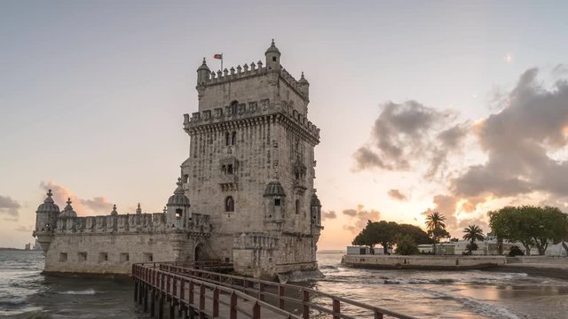 Lisbon Portugal time lapse 4K, city skyline day to night sunset timelapse at Belem Tower
