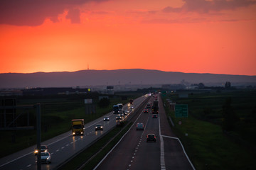 Sunset on the highway with traffic