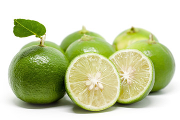 Green lime on white background for food ingredients and cooking concept