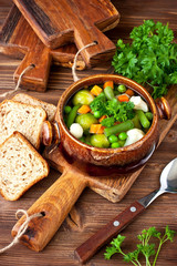 Homemade vegetable soup in  ceramic  bowl . Healthy food concept