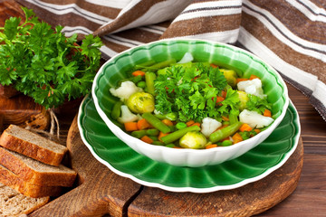 Homemade vegetable soup in  ceramic  bowl . Healthy food concept
