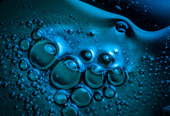 Blue bubbles oil and water mix