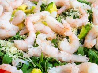 salad with avocado, greens and shrimps, healthy food