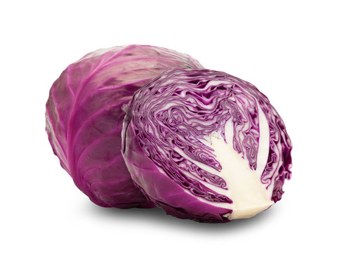 Whole red cabbage and half isolated on white background with clipping path.
