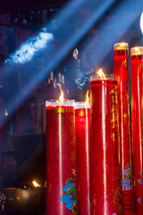 Giant red candle for worship in temple