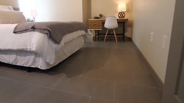 Bedroom Rise from Tile Floor. view moves up from the tile floor to reveal bedroom and desk scene
