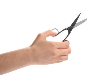 Woman holding scissors on white background, closeup