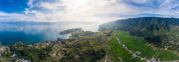 Aerial: lake Toba and Samosir Island view from above Sumatra Indonesia. Huge volcanic caldera...
