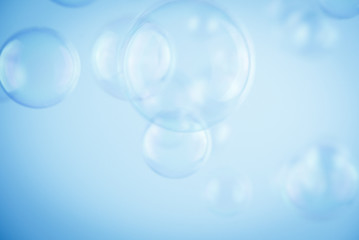 Beautiful abstract close up color white and blue soap bubbles background and wallpaper