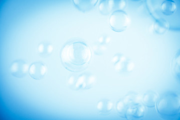 Beautiful abstract close up color white and blue soap bubbles background and wallpaper