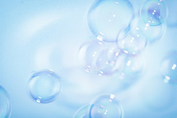 Beautiful abstract close up color white and blue soap bubbles background and wallpaper