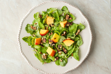 Purslane Salad with Peach Fruit, Roasted Walnuts and Pine Nuts.