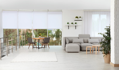 Living room with modern furniture and stylish decor. Ideas for interior