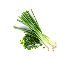 Cut fresh green onions on white background, top view