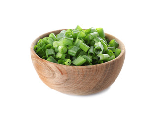 Wooden bowl with cut green onion on white background