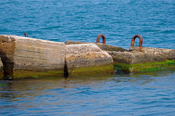 Fototapeta premium big breakwater on the sea