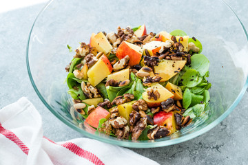 Purslane Salad with Peach Fruit, Roasted Walnuts and Pine Nuts.