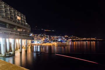 Fototapeta na wymiar Seashore with buildings in Monaco in the night.
