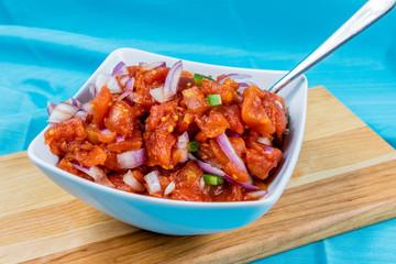 Colourful red tomato salsa in bowls. Calgary, Alberta, Canada