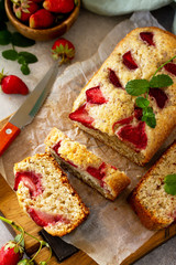 Delicious summer dessert strawberry pie, sweet delicious holiday cake with strawberry on a light stone or slate table. Top view flat lay background.