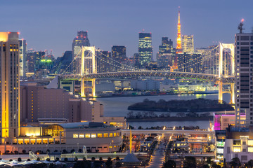 Tokyo tower with rainbow bridge sunset