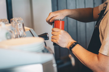 manual coffee grinder, barista cafe making coffee