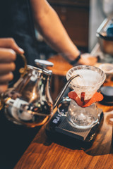 Barista making drip coffee in coffee shop, barista cafe making coffee, coffee maker