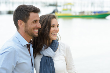 beautiful young couple on the waterfront
