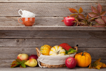 Autumn still life with pumpkins and fruits