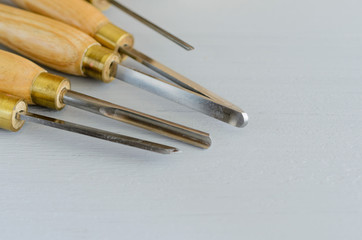 used wood lathe chisels on the wooden table