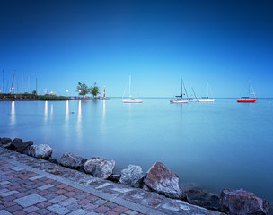 Sailboats on lake Balaton in the port at night