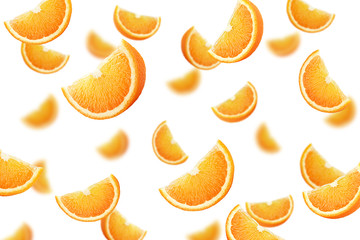Falling orange slice isolated on white background, selective focus