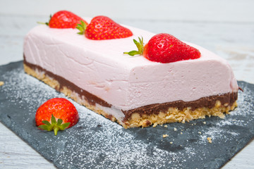 Chocolate strawberry yogurt cake decorated with fresh fruits