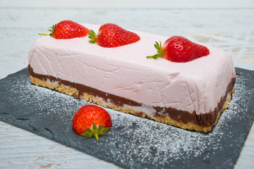 Chocolate strawberry yogurt cake decorated with fresh fruits